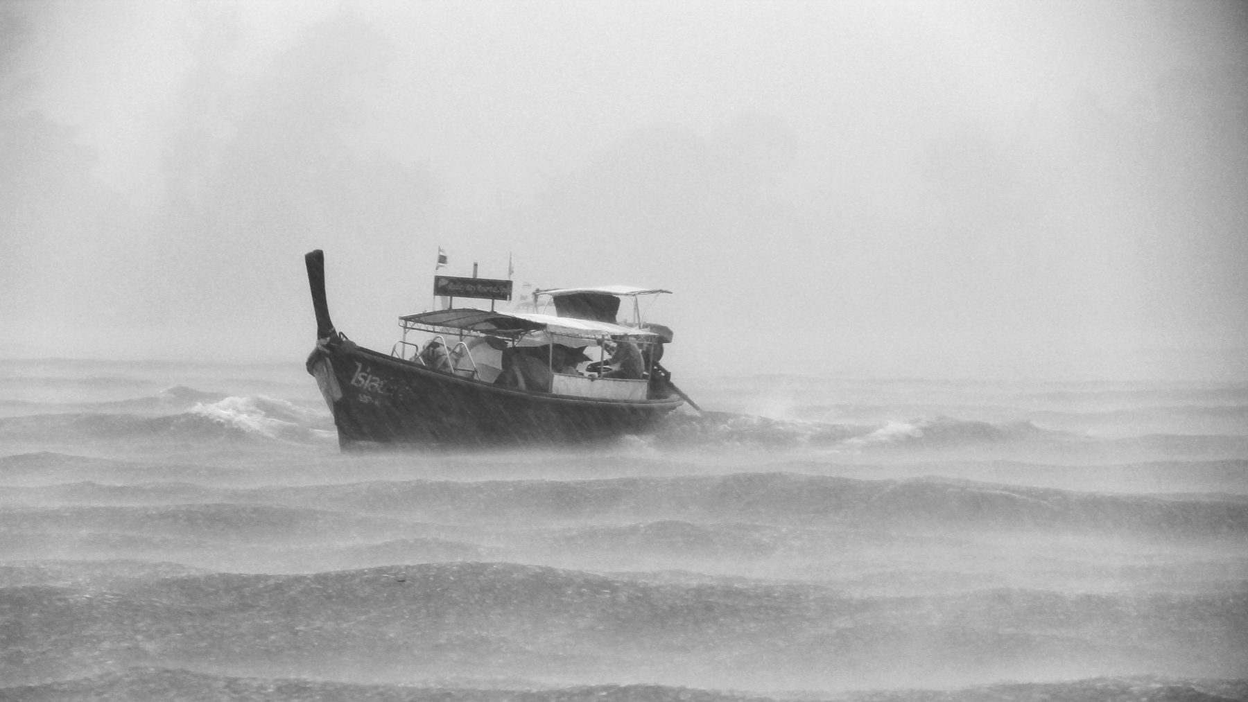 You are caught in severe weather while boating